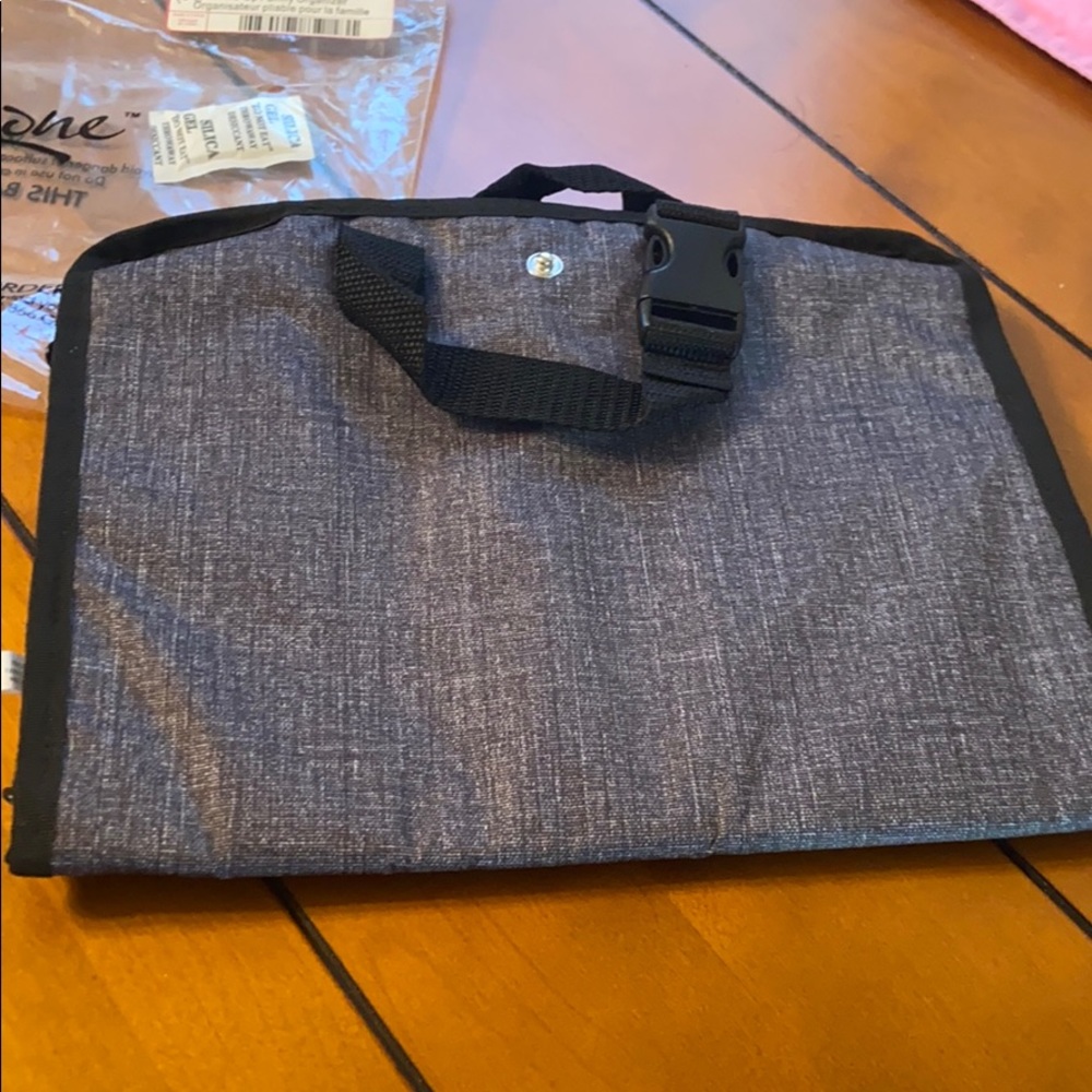 New in bag- grey fold up family organizer